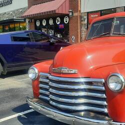 Day 3. Looked around the shops today, & we came across two vehicles that couldn't be more different