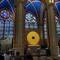 This is the new tabernacle, designed as a golden radiating disk with a central cross. It holds the B