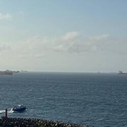 OIL barges as far as the eyes could see