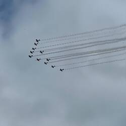 Small formation of airplanes flying near Chippewa Falls.
