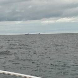 Are they about to collide? No, the big ship is several miles away from the small one.