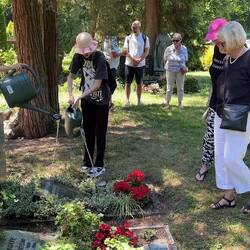 watering Gerhard's resting place