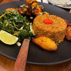 Beef skewers and jollof rice