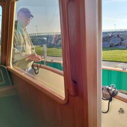 Preston uses remote control with his DockMate to manoeuvre us off the wall at Rogers City