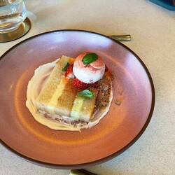 Cake with lemon and lime curd, koji ice cream, strawberries