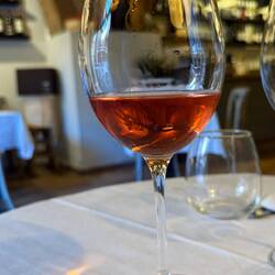 Pinot Grigio can be rosé, it seems? Delicious, perfect for a hot day, and €6/glass.