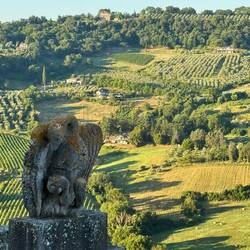 Figure on top of the Roman gate on the west side.
