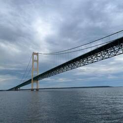 Heading west, we slip beneath the Straits Bridge