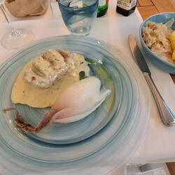 A beautiful dinner - roast pork fillet, mustard sauce and this incredible sweet lotus shaped onion