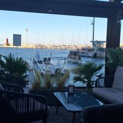 The singing captain in the background - usually he wears bright pants but all in white today