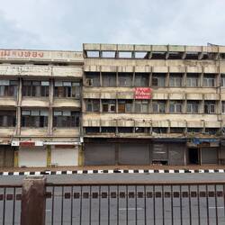 It appears as if the monkeys live in these buildings. Many of the units seem to have been abandoned.