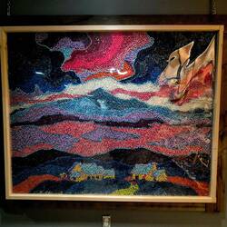 Tableau fait avec des punaises.