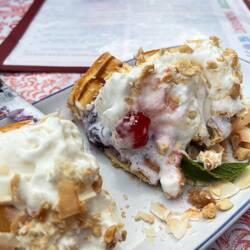 Coconut ice cream, blueberry jam, peanuts, potato bun