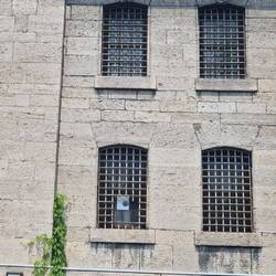 The gap in the bars where someone did escape after bribing the guards