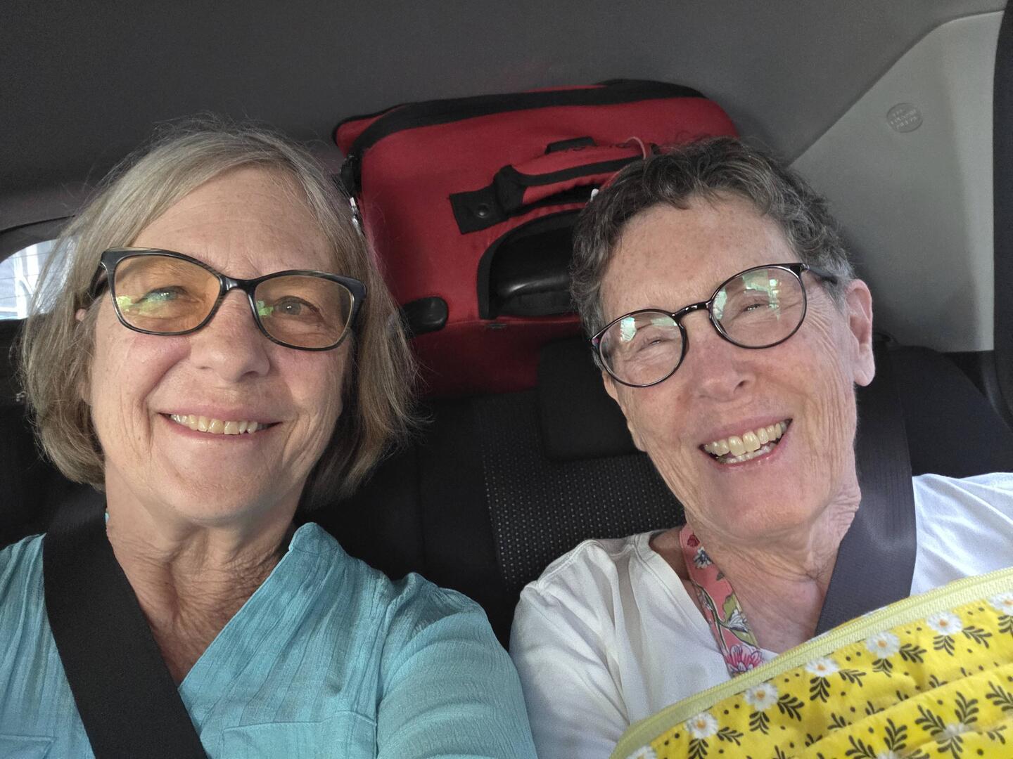 We crammed the four of us into a small Uber.  The bags barely fit!