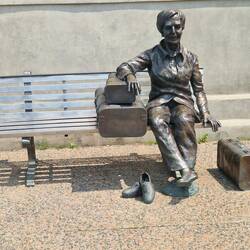 V. poignant outside pier 21 .Migrant waiting collection not knowing what the future holds. Love this