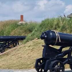Preparing the cannon for firing at midday