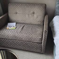 Mary really likes this little sofa bed in our room.