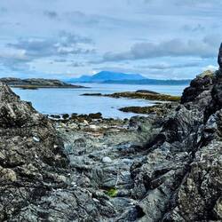 Coast view through boulders