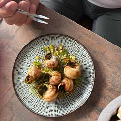 We had to try snails! They were bland and tiny but bucket list ticked