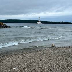 Interesting intersecting wave patterns at harbor's west breakwater.