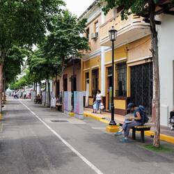 Street with portraits and short biographies of Sandinista revolutionaries.