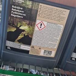 "Des Kunden Liebling"-Aufkleber auf mystischer Flüssigkeit...