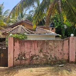 His house, lives with his Uncle and brothers, mother lives a few houses down with sister