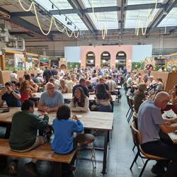 A packed food hall in Chester Market