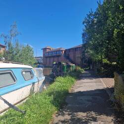 Moored by steps to a little park between the canal and the city wall