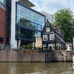 One of the many leaning buildings. Amsterdam is built on reclaimed land and 11 million pillars!