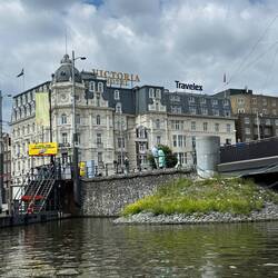 The Victoria Hotel couldn't buy out two home owners so they built around them! ( the brown bricks)