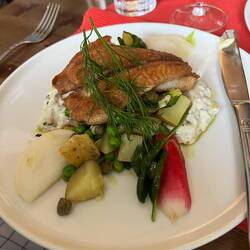 Perch with rye crust, root vegetables, and tartar sauce.