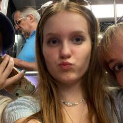 The three least favourite children sharing two seats on the metro