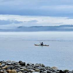 Kayaker headed into fog