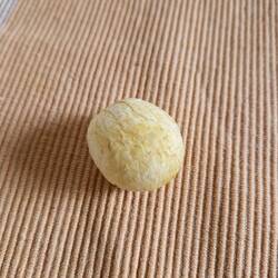 Has a membrane on it like a boiled egg