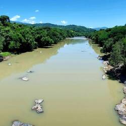 Typical Salvadoran landscape: high, forested hills, many rivers.