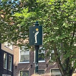 Lily took great joy in these urinal signs