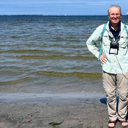 Port of Tallinn with an inbound ferry over Tom's shoulder