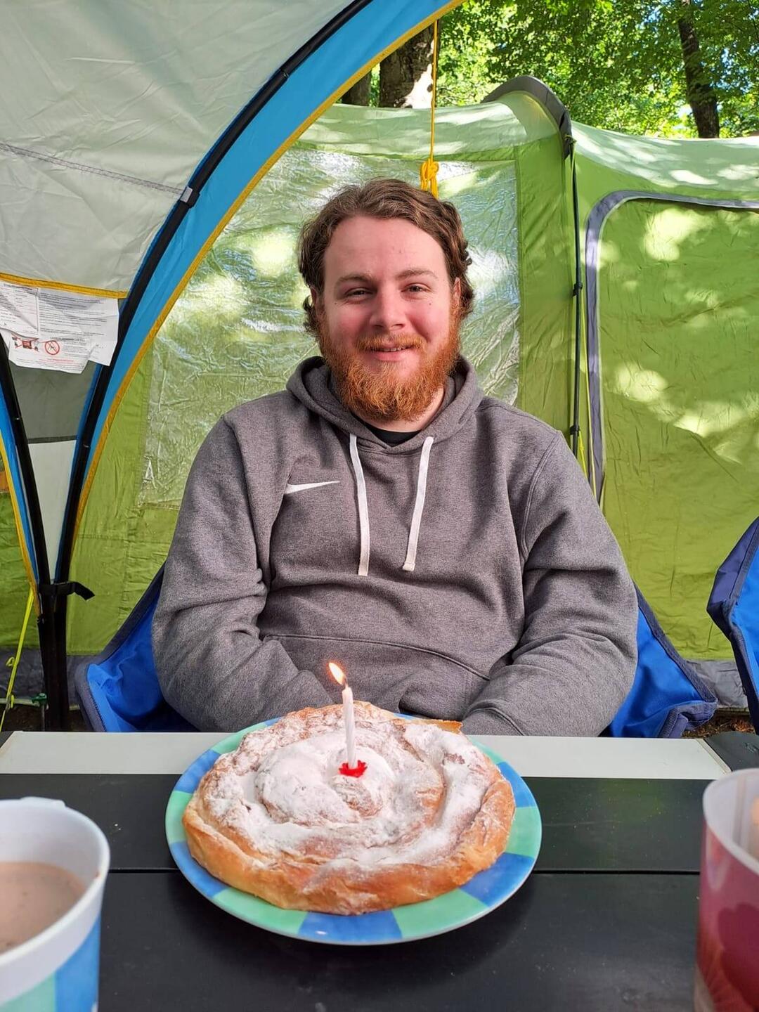 The birthday boy with his ensaimada