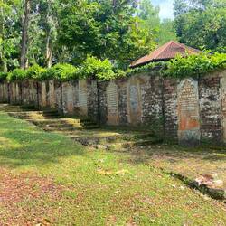 Old cemetery. Used headstones to form wall