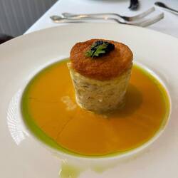 Crab soufflé with saffron sauce
