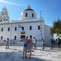 Bros in front of some church
