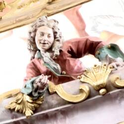 The statue of the younger Asam brother as a personalized "signature", done by the older brother