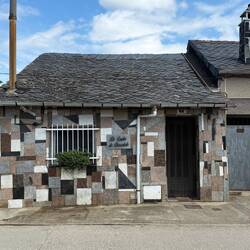 There were a number of buildings with this unique mosaic-like tiling. Did not stop for chocolate.