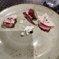 Appetizer at Portobellos: crostini, cube of tuna, veal, anchovies