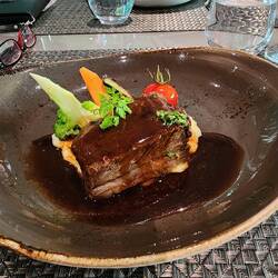 Main course: beef short ribs, roasted garlic potato, red wine gravy