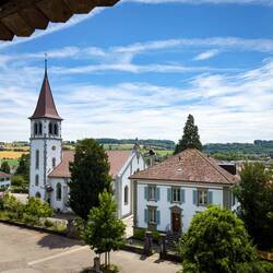 The Catholic Church from the ramparts of the old city walls — Murten.