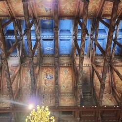 The ceiling of the chamber is intended to resemble a long house.