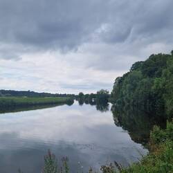 Rainboat moored in the distance on the right